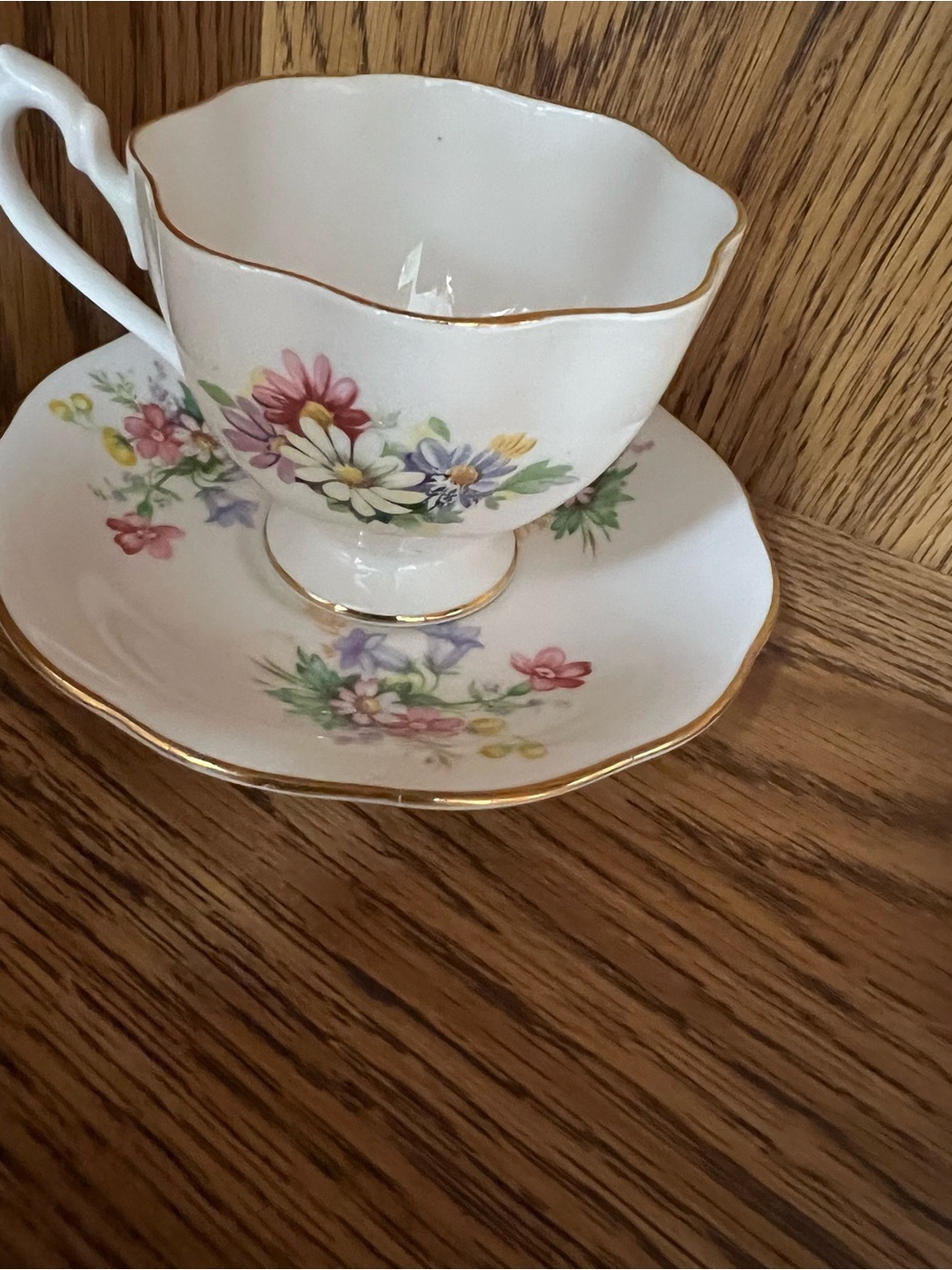 Fine Bone China Floral Teacup and Saucer with Gold Trim - White